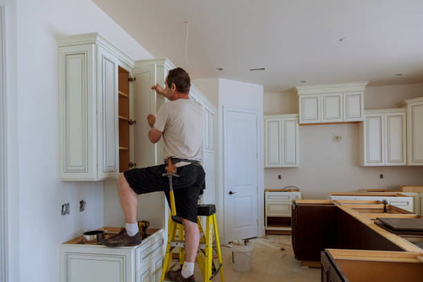 Kitchen island installation in Black Diamond by JMT Kitchen Cabinet
